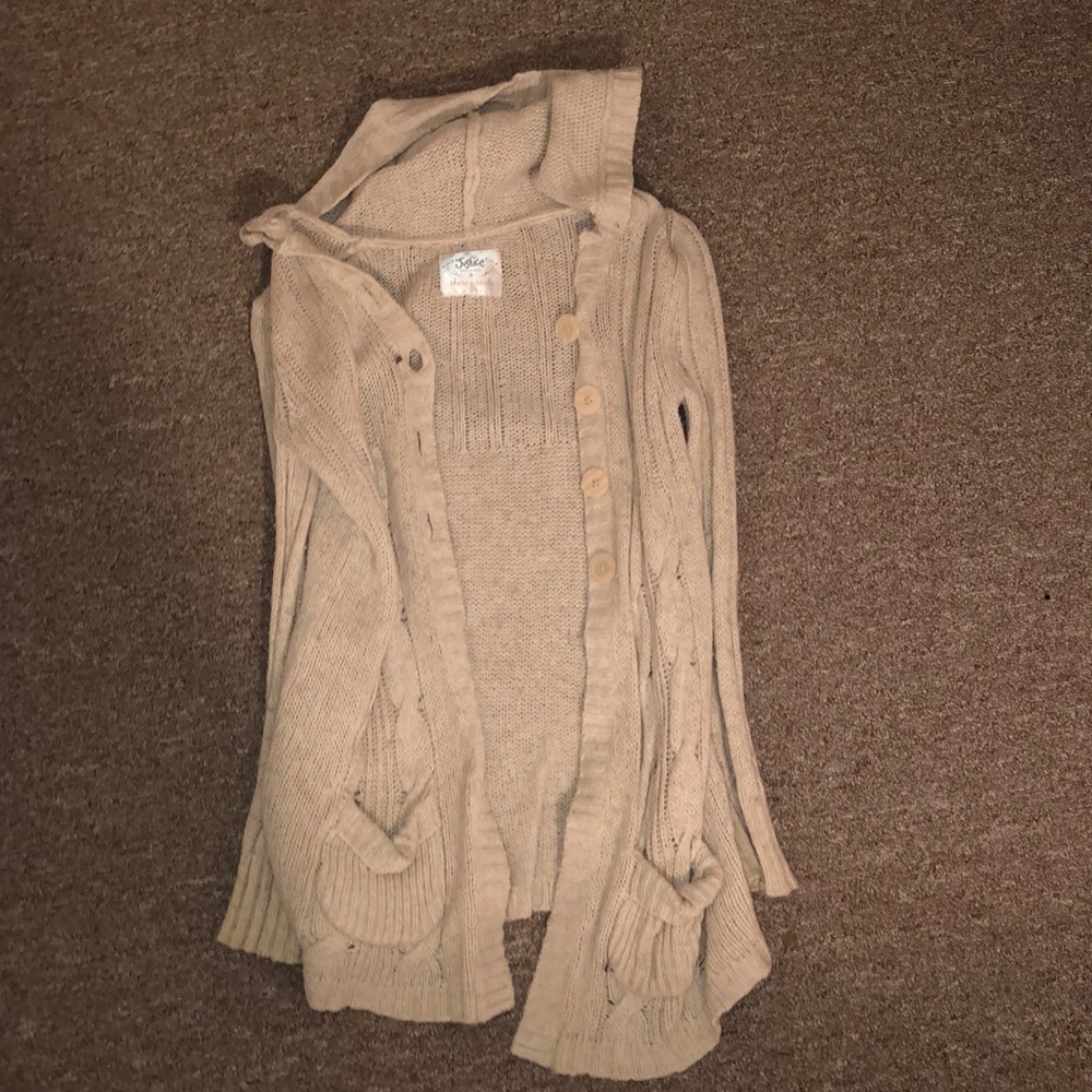 Cream colored cardigan sweater